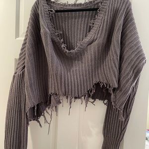 Distressed crop sweater